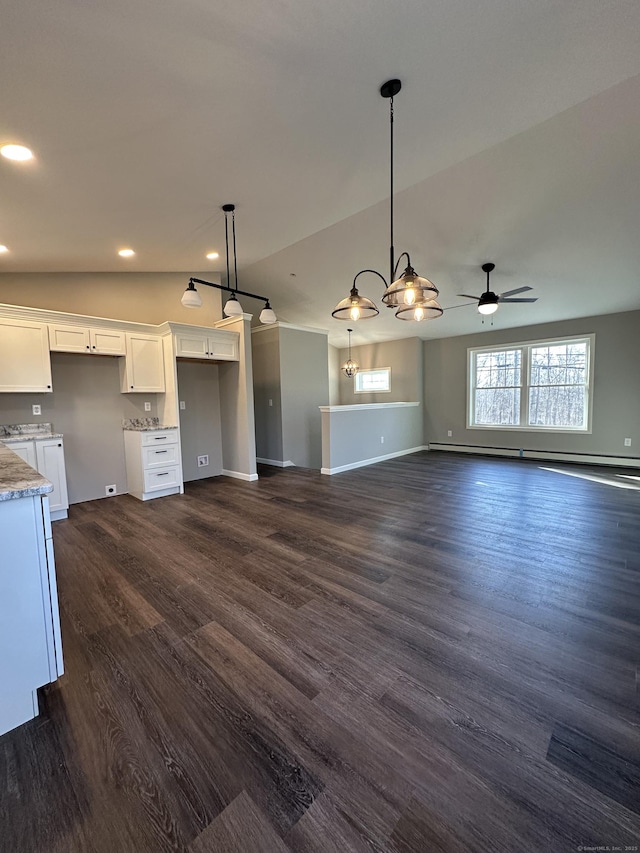 unfurnished living room featuring baseboards, a baseboard radiator, lofted ceiling, recessed lighting, and dark wood-style flooring