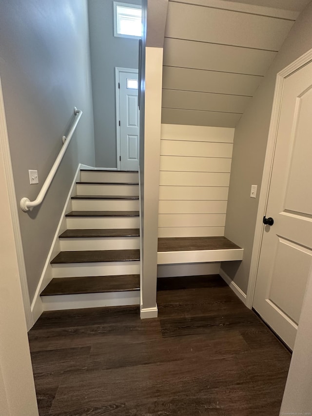 stairs with wood finished floors