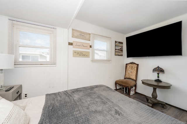 bedroom featuring wood finished floors