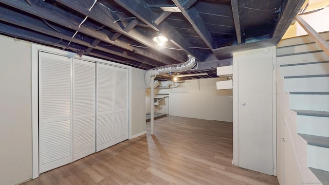 basement with light wood-type flooring