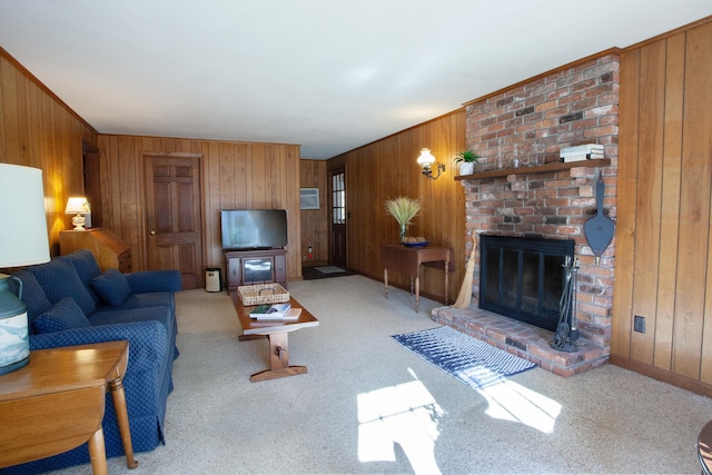 living area with a brick fireplace, carpet flooring, and wooden walls