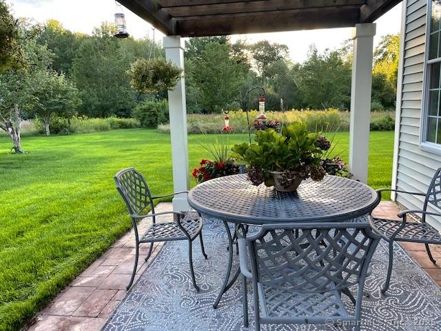 view of patio featuring outdoor dining space