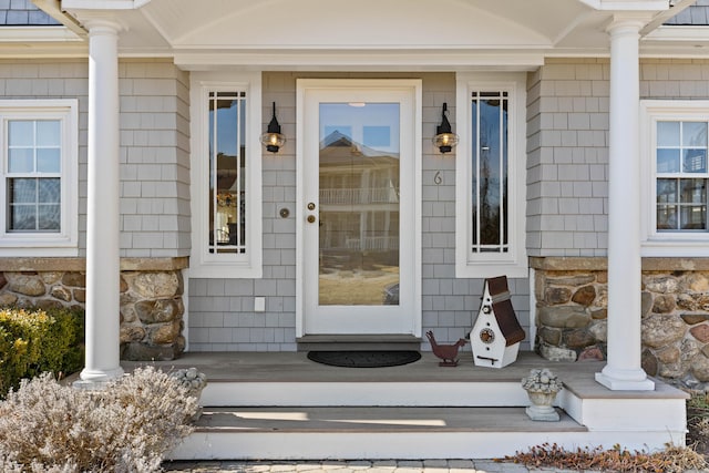 view of exterior entry with stone siding