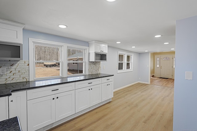 129 Smith Rd, East Haddam, CT 06423 - kitchen featuring tasteful backsplash, light wood finished floors, baseboards, white cabinetry, and recessed lighting