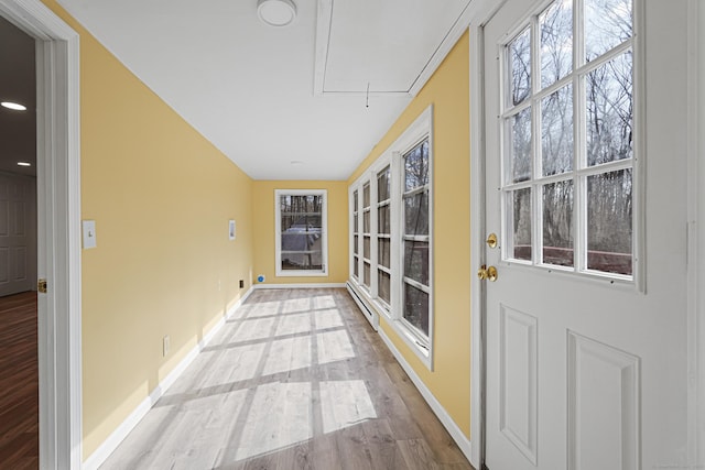 129 Smith Rd, East Haddam, CT 06423 - unfurnished sunroom with a baseboard radiator and a healthy amount of sunlight
