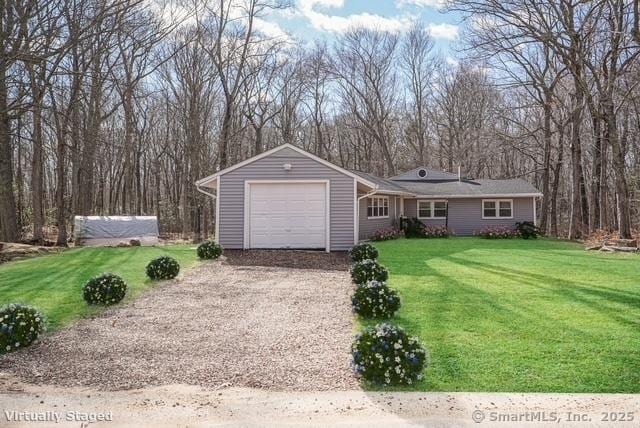 129 Smith Rd, East Haddam, CT 06423 - ranch-style house featuring a garage, gravel driveway, and a front yard
