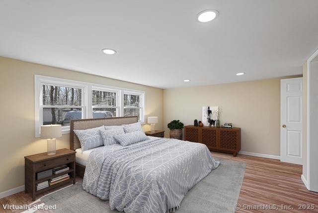129 Smith Rd, East Haddam, CT 06423 - bedroom with wood finished floors, baseboards, and recessed lighting