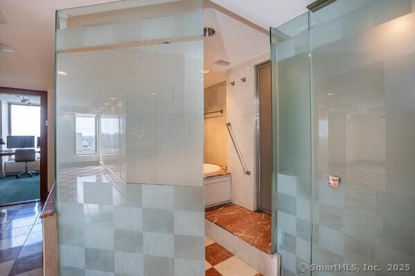 bathroom featuring a stall shower