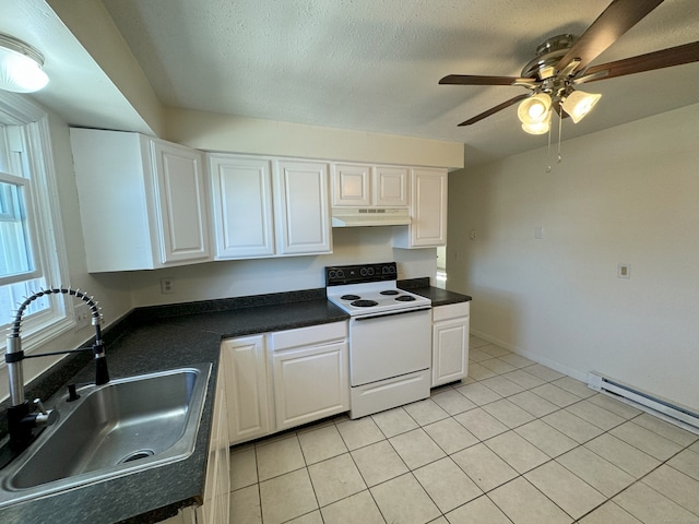 kitchen featuring dark countertops, ceiling fan, under cabinet range hood, white electric range oven, and a sink