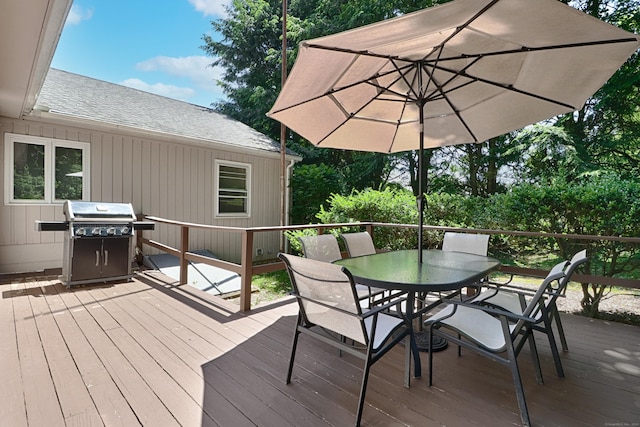 68 Hawthorne Dr, Fairfield, CT 06825 - wooden terrace with area for grilling and outdoor dining area
