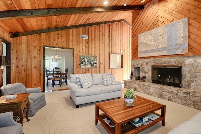 68 Hawthorne Dr, Fairfield, CT 06825 - living room with wooden walls, a chandelier, wooden ceiling, and a fireplace