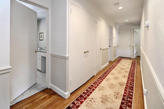 68 Hawthorne Dr, Fairfield, CT 06825 - hallway featuring recessed lighting and light wood finished floors