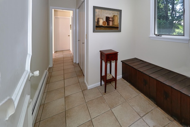 68 Hawthorne Dr, Fairfield, CT 06825 - hall featuring a baseboard radiator and light tile patterned floors