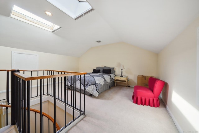 carpeted bedroom featuring a skylight, vaulted ceiling, baseboards, and recessed lighting