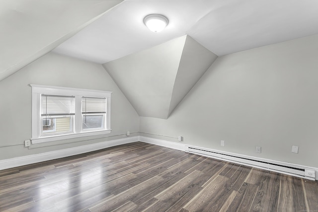 bonus room with a baseboard radiator, lofted ceiling, baseboards, and wood finished floors