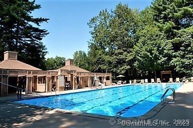 15 Canterbury Ln Unit 15, Avon, CT 06001 - community pool featuring a patio