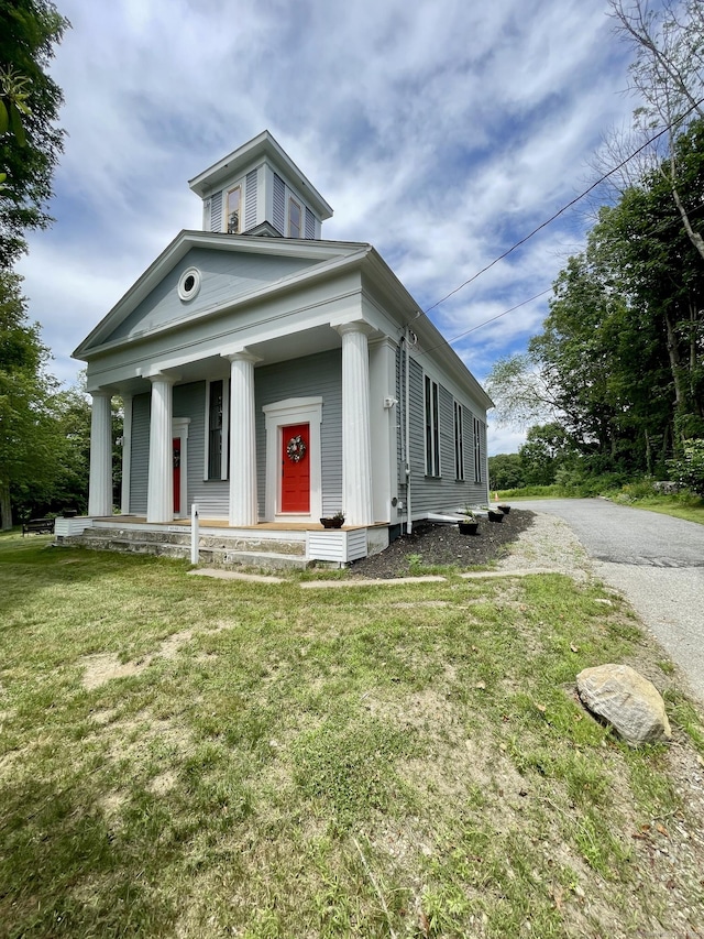160 Halls Hill Rd, Killingly, CT 06239 - greek revival inspired property featuring a front yard and a porch