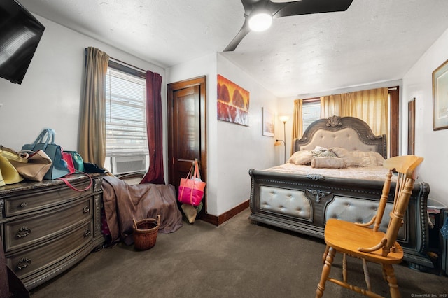 carpeted bedroom with ceiling fan, cooling unit, and baseboards