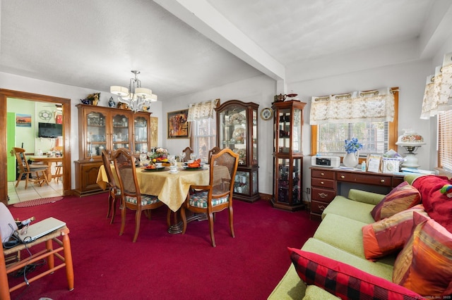 dining area with dark colored carpet, beamed ceiling, and an inviting chandelier