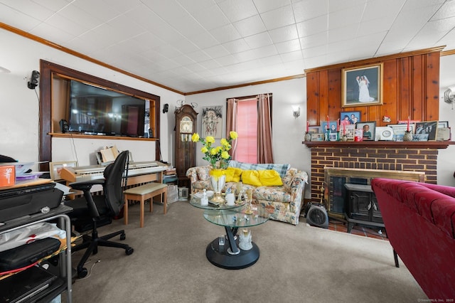 living area with a brick fireplace, carpet floors, and ornamental molding