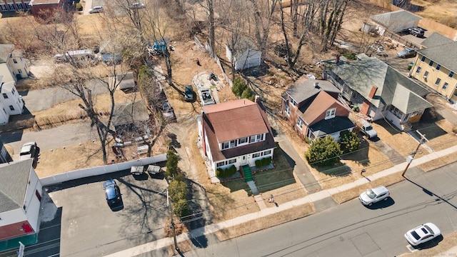 birds eye view of property with a residential view