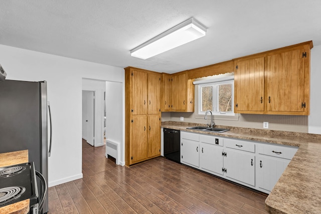 kitchen featuring radiator, dark wood-style flooring, range with electric cooktop, a sink, and black dishwasher