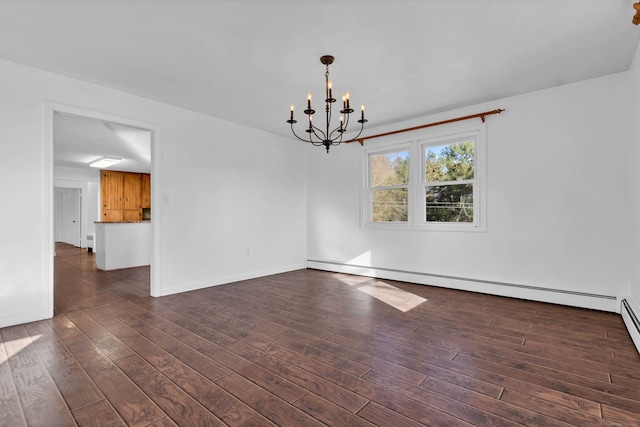 empty room featuring a chandelier, baseboard heating, baseboards, and dark wood-style flooring