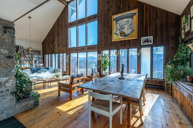 sunroom / solarium with a wealth of natural light and lofted ceiling