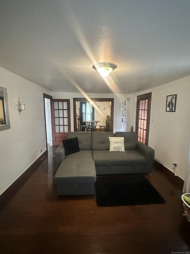 living room with wood finished floors