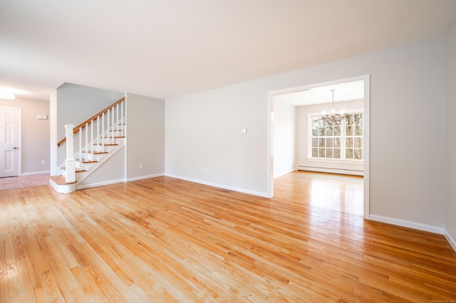 2 Old Middle Rd, Brookfield, CT 06804 - unfurnished living room with a baseboard radiator, light wood finished floors, stairway, and a chandelier