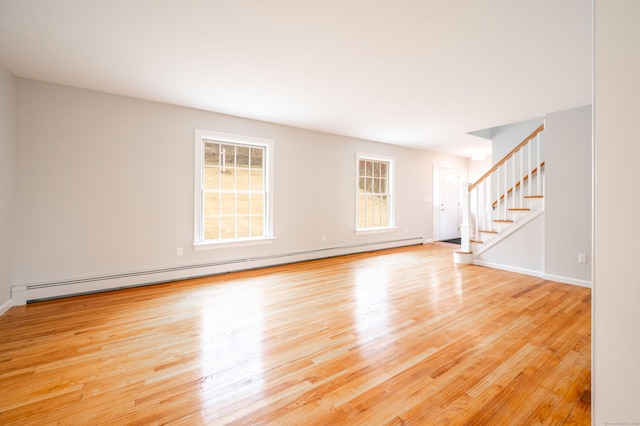 2 Old Middle Rd, Brookfield, CT 06804 - unfurnished living room featuring baseboard heating, light wood-style flooring, stairs, and baseboards