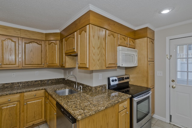 kitchen with dark stone countertops, ornamental molding, a sink, appliances with stainless steel finishes, and a textured ceiling