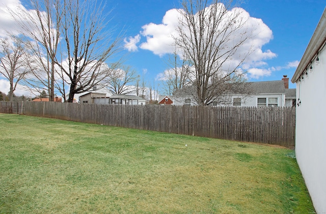view of yard with fence