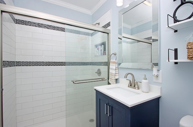 bathroom with vanity, ornamental molding, a shower stall, and toilet