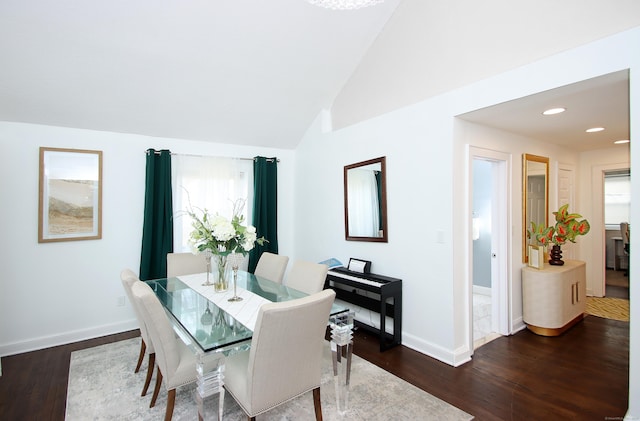 dining area with vaulted ceiling, recessed lighting, dark wood-style floors, and baseboards