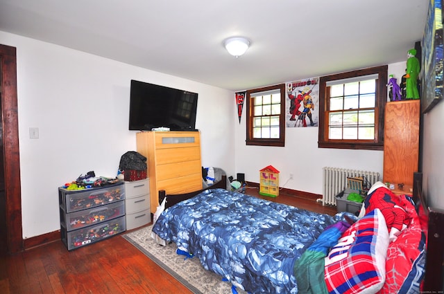 61 E St, Bethlehem, CT 06751 - bedroom with radiator, hardwood / wood-style floors, and baseboards