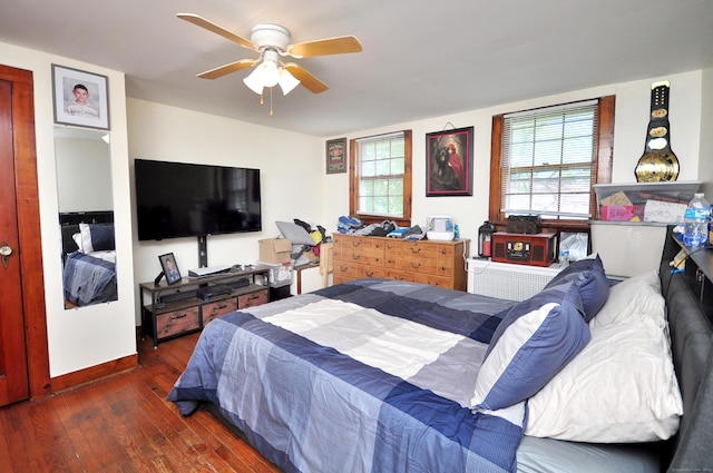 61 E St, Bethlehem, CT 06751 - bedroom with hardwood / wood-style flooring, baseboards, and a ceiling fan