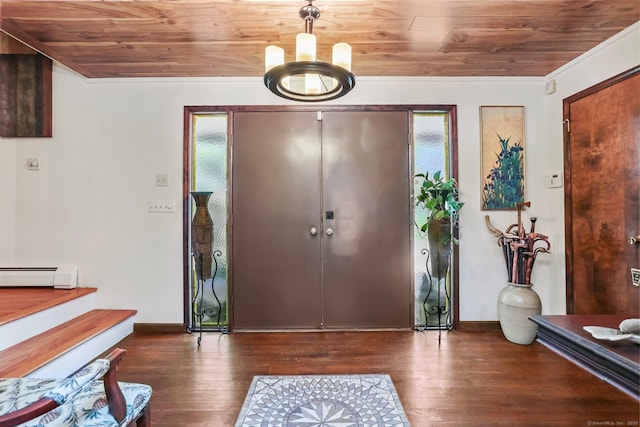 135 Wildwood Dr, Stratford, CT 06614 - entrance foyer with a baseboard radiator, hardwood / wood-style flooring, baseboards, and wood ceiling