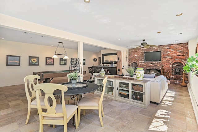 135 Wildwood Dr, Stratford, CT 06614 - dining space featuring a ceiling fan, baseboards, a fireplace, and recessed lighting