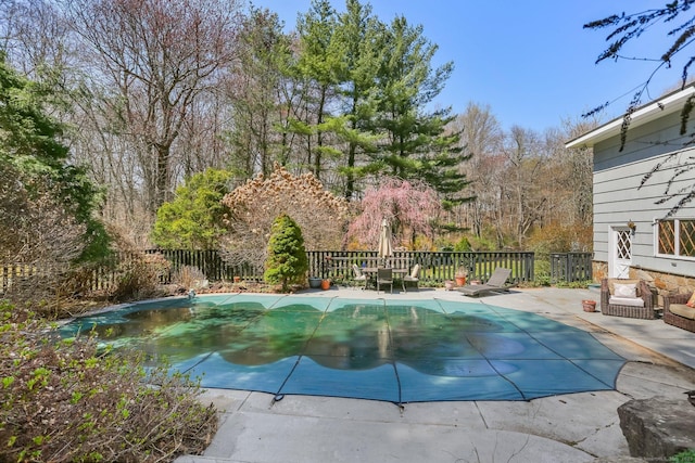 135 Wildwood Dr, Stratford, CT 06614 - view of swimming pool featuring fence, a patio area, and a fenced in pool