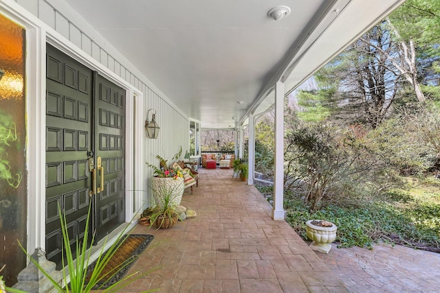 135 Wildwood Dr, Stratford, CT 06614 - view of patio / terrace featuring covered porch