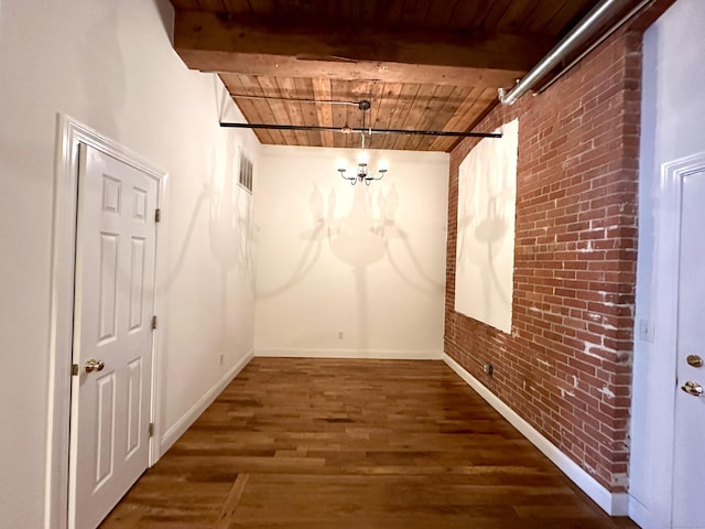 145 Canal St Unit 104, Shelton, CT 06484 - spare room featuring a wooden ceiling with exposed beams, brick wall, a chandelier, and wood finished floors
