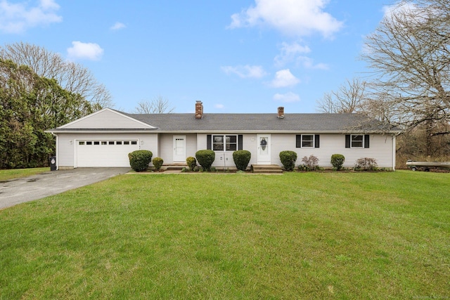 ranch-style home featuring concrete driveway, a front yard, a chimney, and an attached garage