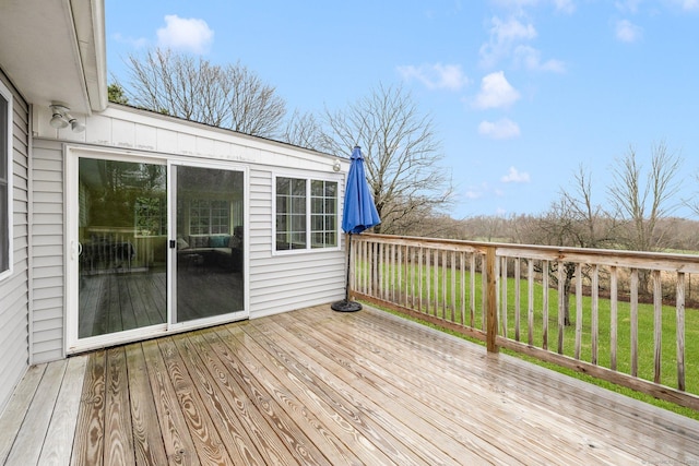 deck featuring a yard
