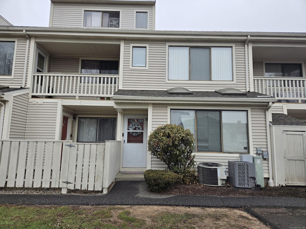 multi unit property featuring a balcony and central AC