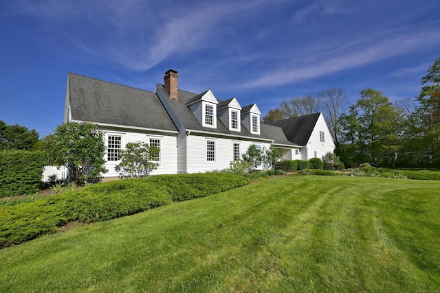 40 Shields Rd, Woodstock, CT 06281 - back of house featuring a chimney and a yard