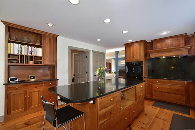40 Shields Rd, Woodstock, CT 06281 - kitchen featuring dark countertops, light wood-type flooring, open shelves, brown cabinets, and recessed lighting
