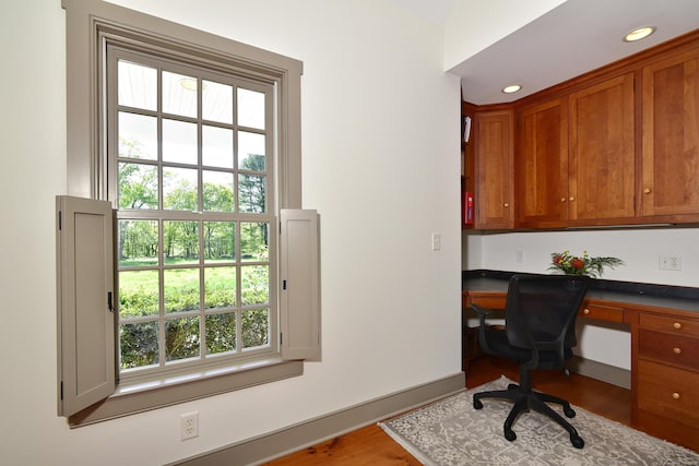 40 Shields Rd, Woodstock, CT 06281 - office area with built in desk, healthy amount of natural light, wood finished floors, recessed lighting, and baseboards