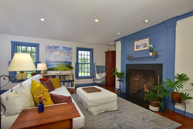 40 Shields Rd, Woodstock, CT 06281 - living area with a fireplace, wood finished floors, baseboards, and recessed lighting