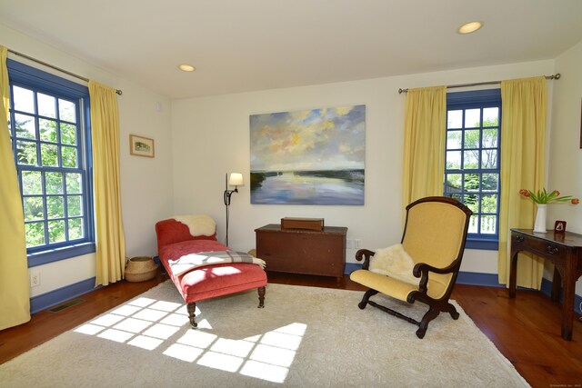 40 Shields Rd, Woodstock, CT 06281 - living area with wood finished floors, healthy amount of natural light, baseboards, and recessed lighting